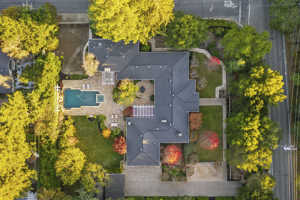 Drone shot of the exterior of a los angeles home, highlighting landscaping.